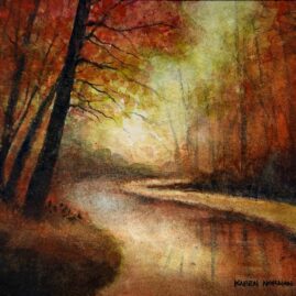 Trees in Autumn by a stream